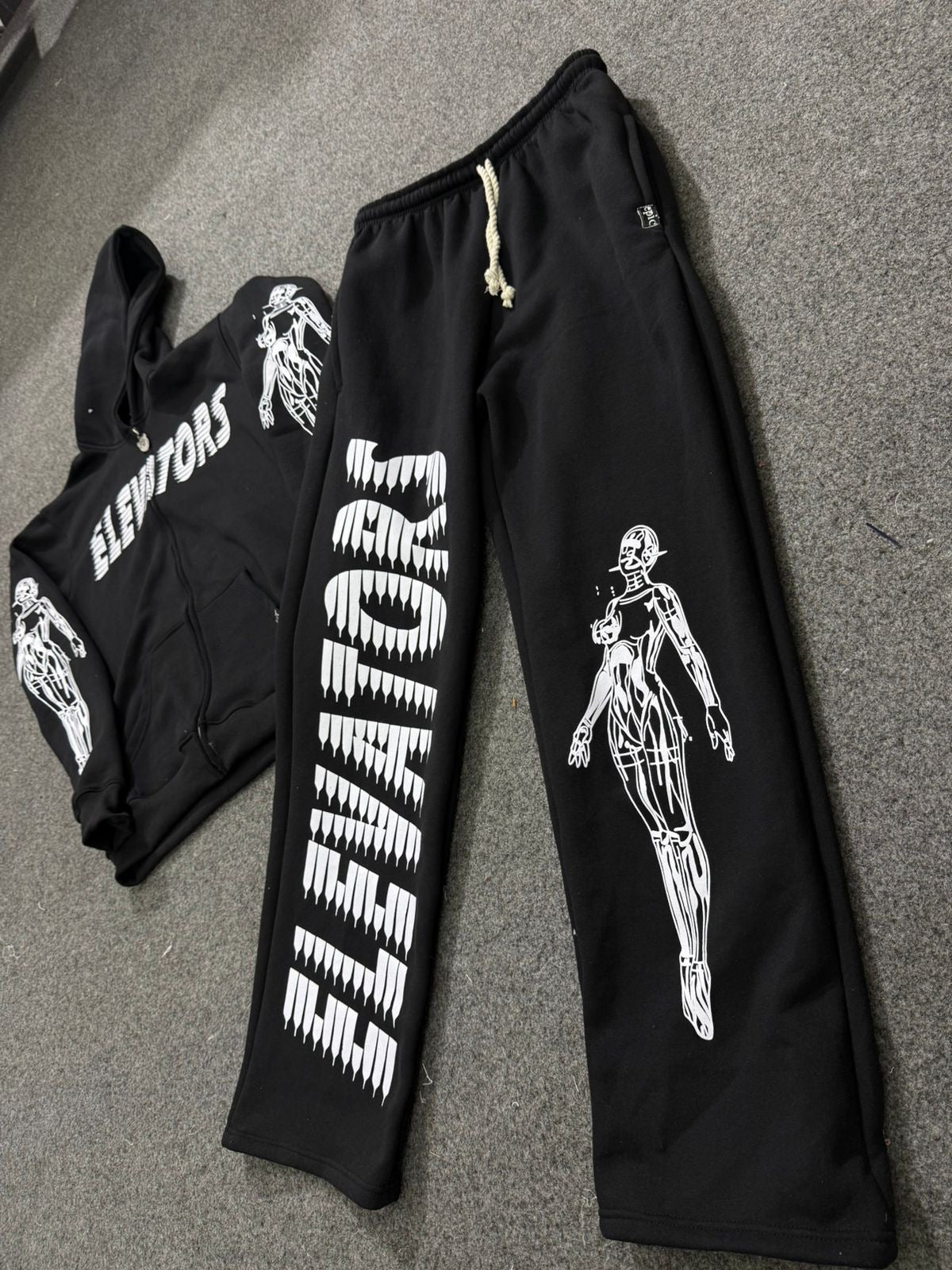 Elevators Joggers paired with a matching hoodie, showcasing stylish design and comfort for everyday wear.