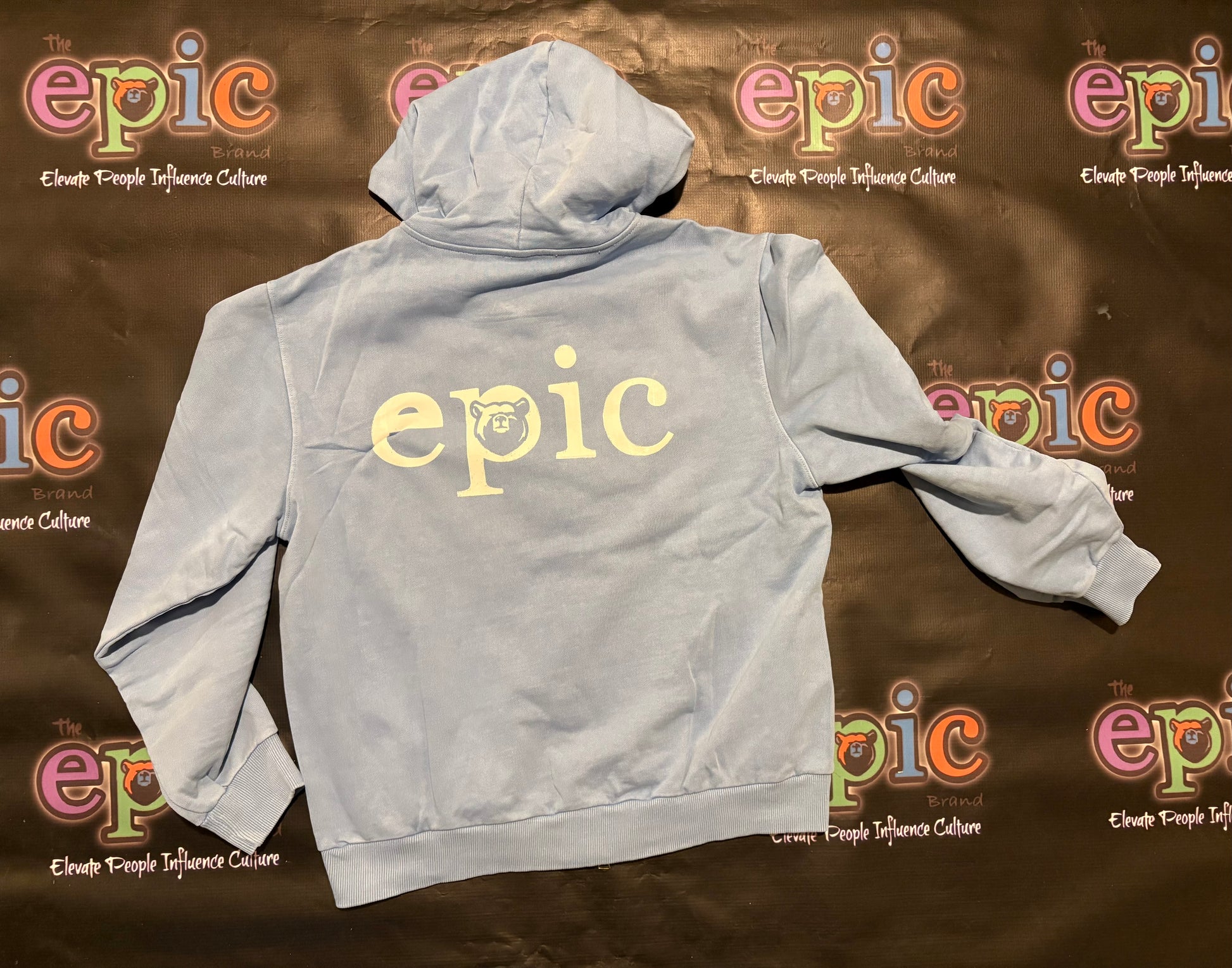 Heavyweight Epic Jogger set zip-up hoodie in powder blue color with 'epic' logo on the back.