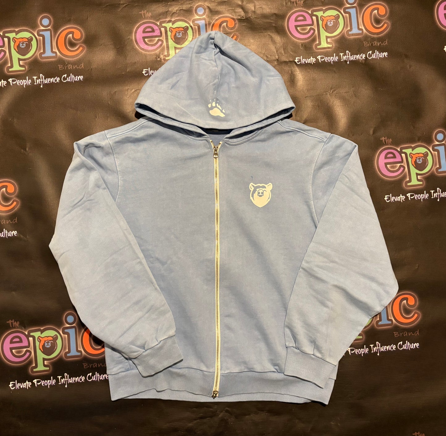 Heavyweight Epic Jogger set zip up hoodie in stylish powder blue color against epic culture backdrop.