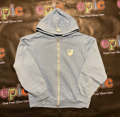 Heavyweight Epic Jogger set zip up hoodie in stylish powder blue color against epic culture backdrop.